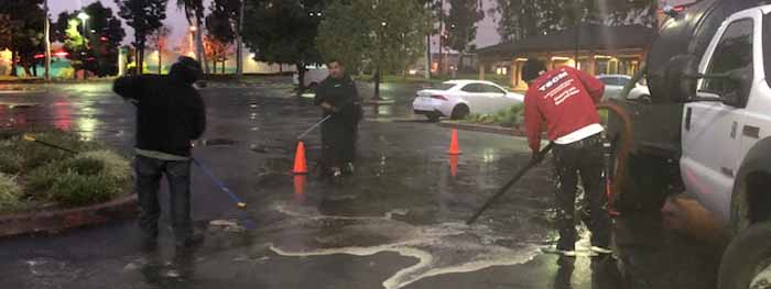 High pressure washing cooking oil grease spill clean up. Hot pressure wash cleaning of oil spill in a parking lot. We are a company that cleans up oil spills on concrete