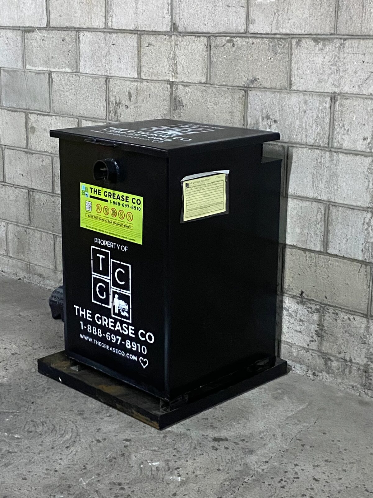 Branded The Grease Co used cooking oil container