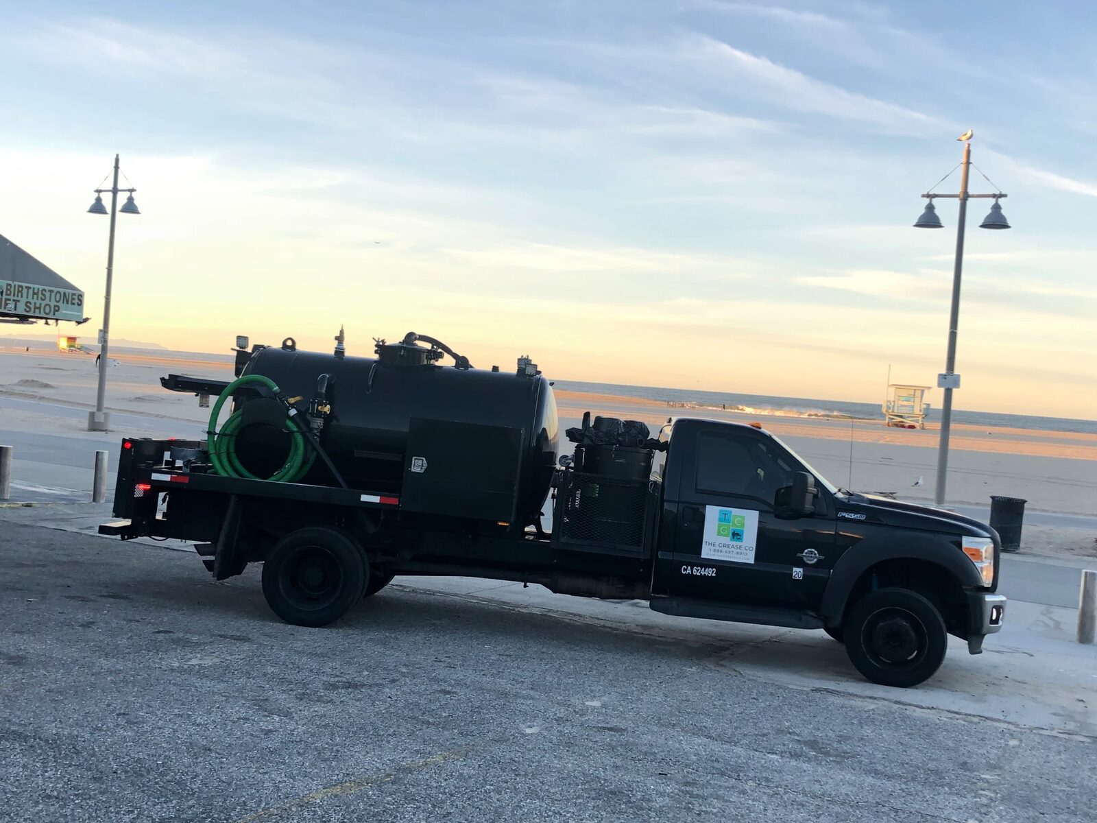 The Grease Co vacuum truck on a coastal collection route — industrial oil service in Brea